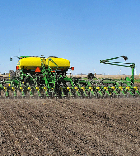 Farmer Kelly planting corn