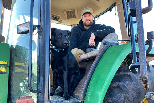 Iowa farmer Kyle and his dog